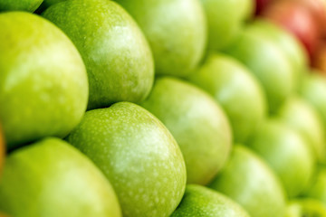 Big stack of green apples