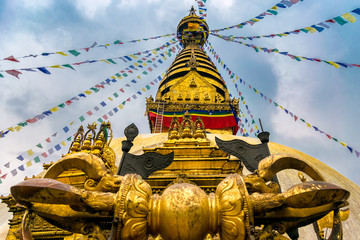 golden buddhist temple with golden pagoda stupa in monkey temple in kathmandu. nepal
