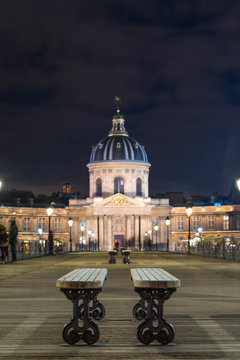 Fototapeta River Seine with Pont des Arts and Institut de France at night in Paris
