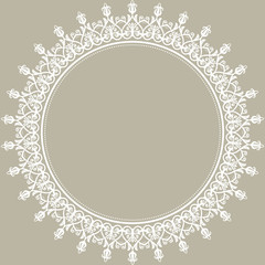 Oriental round frame with arabesques and floral elements. Floral fine border with vintage pattern. Greeting card with place for text