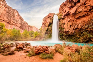 Foto op Canvas Beautiful Blue Waterfall coming out of canyon © MeganBetteridge