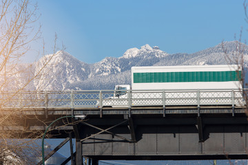 image of truck in the bridge road winter for text
