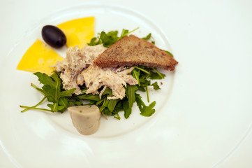 Fresh salad with chicken, cheese and olive