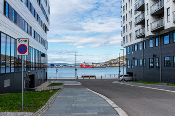 Fototapeta na wymiar Street and panorama of Hammerfest, Kvaloya island, Norway