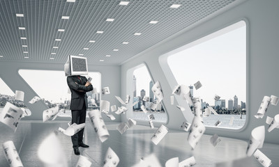 Businessman with monitor instead of head.