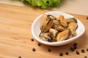 Mussels in oil on a plate