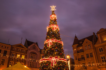 Christmas market on main square at night. Grudziadz. Poland