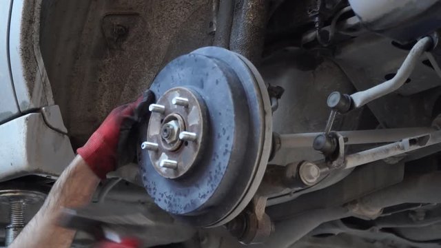 removal of brake disks of the car. car repair process
