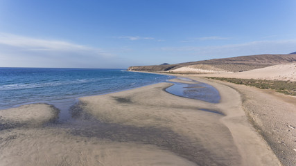 Aerial view of sand banks, dunes on white beach, Jandia, Costa Calma, Fuerteventura, Canary Islands .