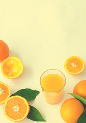 Freshly squeezed orange juice in glass on white background
