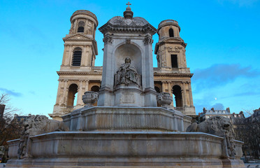 Fototapeta na wymiar The view of of Saint-Sulpice fontain and church in Paris, France
