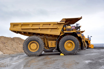 heavy-duty dump truck for transportation of soil, overburden and ore on construction sites and quarries