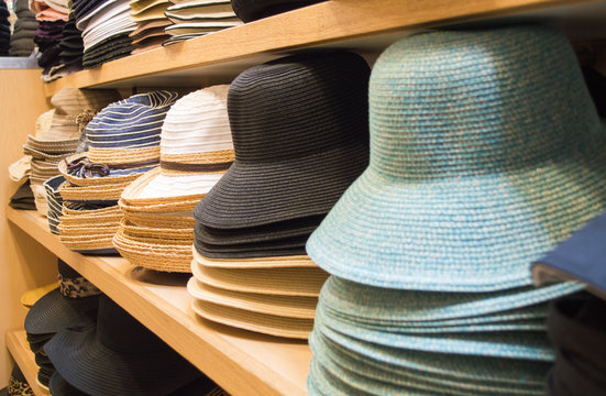 rows of colorful hats on shelves
