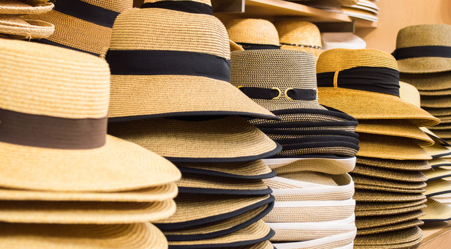 rows of stylish hats in a shop