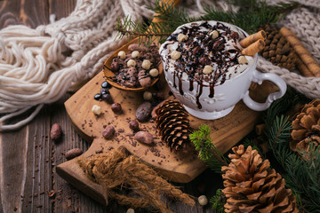 Christmas or New Year composition with hot chocolate or cocoa drink with whipped cream