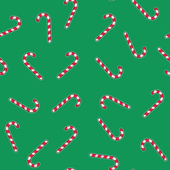 Christmas vector seamless green pattern with red candy canes. Background for wrapping paper, website background, greeting cards design, etc. Vector