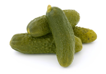 Three pickled cucumbers isolated on white background