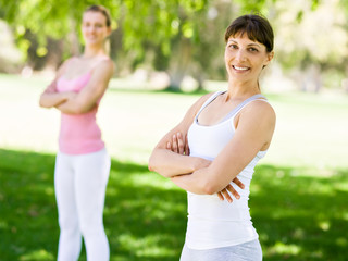 Fototapeta premium Young women exercising in the park
