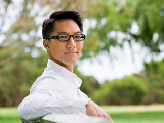 Young businessman during his break in park