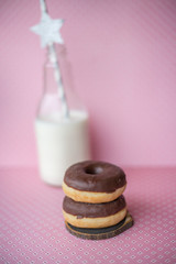 Donuts and milk in a botlle