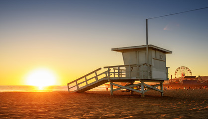 Santa Monica beach lifeguard tower in California USA at sunset - Powered by Adobe