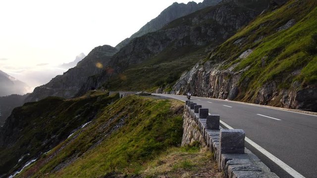 Motorcycle bike driving scenic road in Stein Glacier alps susten pass steinsee in Switzerland 