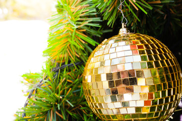 Beautiful decorated christmas tree with gold and red bauble