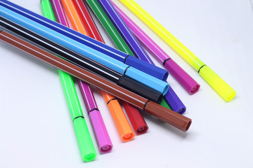 Colored markers isolated on the white background.