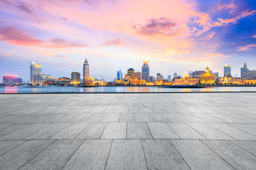 Empty square and modern cityscape at sunset in Shanghai,China