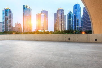 Empty square and modern cityscape at sunset in Shanghai,China