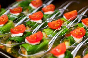 a buffet spoon with delicacies