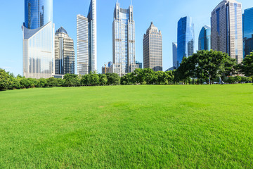 Obraz premium Shanghai commercial district modern urban architecture and green city park,China