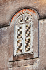Windows of Old Colonial building in Sakon Nakhon, Thailand.