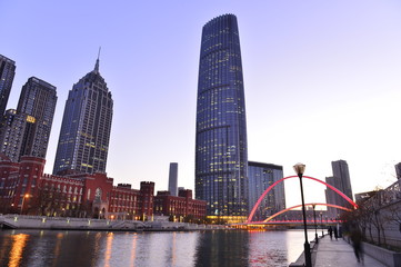 Obraz premium The modern city highway Bridges night landscape car light trails arc in tianjin