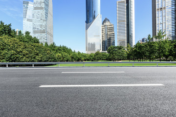 Asphalt highway and modern city commercial buildings in Shanghai,China
