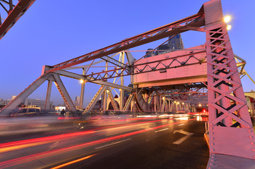 Fototapeta na wymiar The modern city highway Bridges night landscape car light trails arc in tianjin