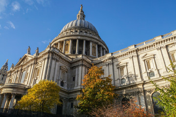 close up beautiful architecture of St. Paul Cathedral in London with bright clear blue sky in autumn