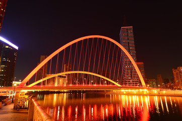 Naklejka na ściany i meble The modern city highway Bridges night landscape car light trails arc in tianjin