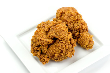 Closeup fried crispy chicken on white