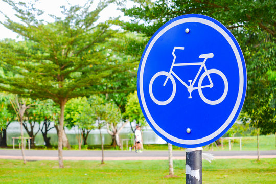 sign of bicycle lane in the park
