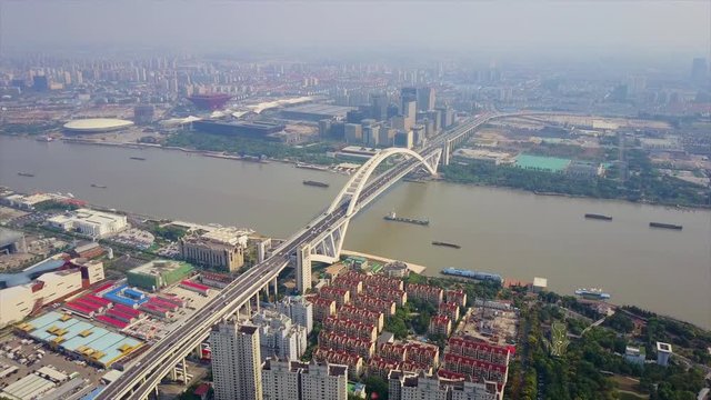 day time shanghai cityscape traffic lupu bridge riverside aerial panorama 4k china
