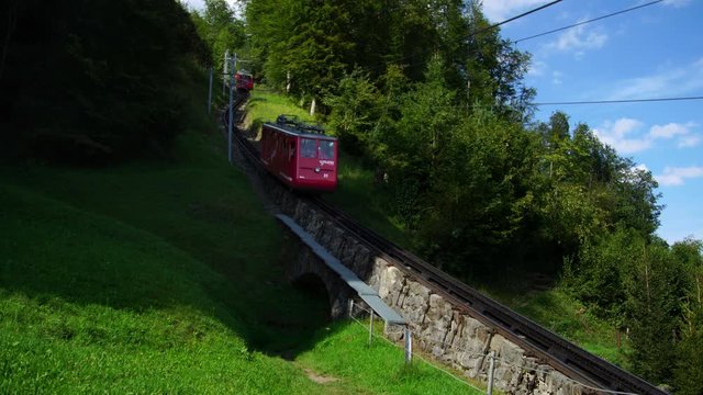 mountain funicular railcar train in Swiss Alps on Lake Lucerne in Luzern Switzerland 