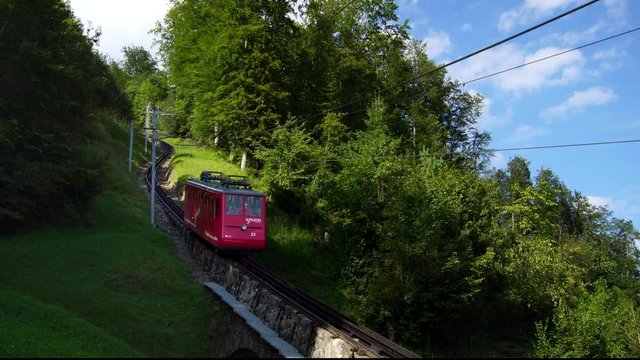 mountain funicular railcar train in Swiss Alps on Lake Lucerne in Luzern Switzerland 