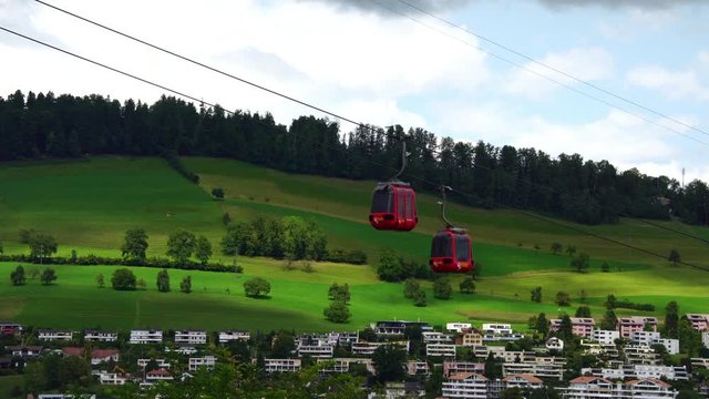 hills of Pilatus and cable car gondola in Swiss Alps near Lake Lucerne in Switzerland 
