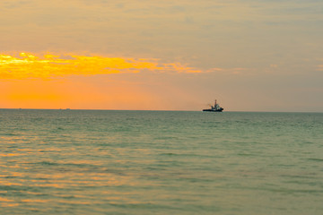 Beach and boat with sunset so beautiful nature.