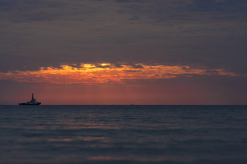 Fototapeta na wymiar Beach and boat with sunset so beautiful nature.
