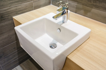 Fototapeta premium Interior of bathroom with sink basin faucet and mirror. Modern design of bathroom