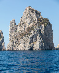 View from the boat on the Faraglioni Rocks on Capri Island, Italy.