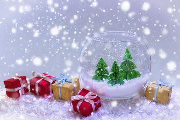 miniature with three paper pine trees in the aquarium