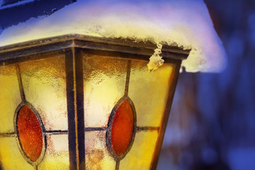 street lantern under the snow, winter night